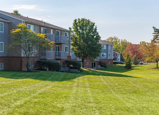 a large lawn in front of an apartment building at Weaver Farm, Florence