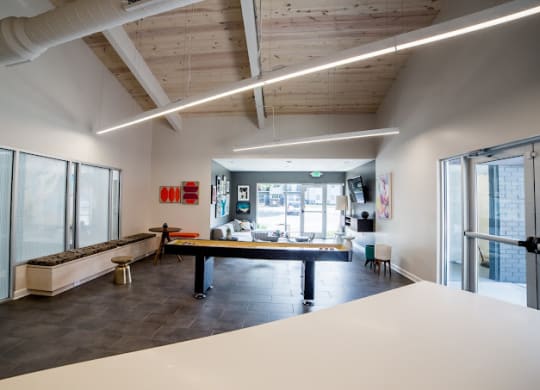 a games room with a ping pong table at 7 Pointe Apartments, Indianapolis, Indiana