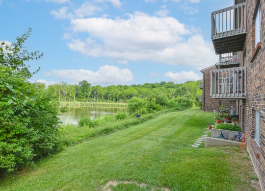 the view from the back yard of a house overlooking a lake at The Woodridge Collection, Fairfield