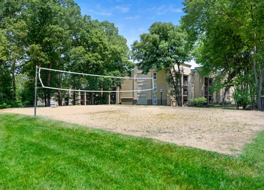 the volleyball court is in front of the building