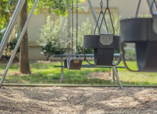 Swings At Playground at Stuart Woods, Herndon