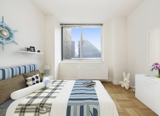 Bedroom with city view at The Ashley Apartments, New York, New York