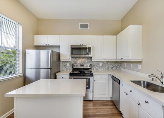 Open-Concept Kitchens with Quartz Countertops and Stainless Steel Appliances at The Estates at Park Place, Fremont, California
