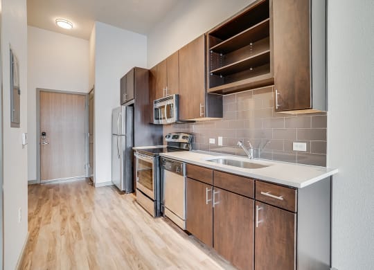 Stainless Steel Appliances and Backsplashes in Kitchen at The Casey, Denver, Colorado