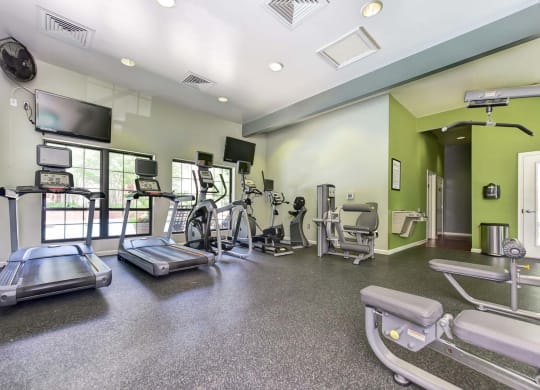 Windsor Oak Creek onsite gym with cardio equipment and a flat screen tv in Fairfax VA