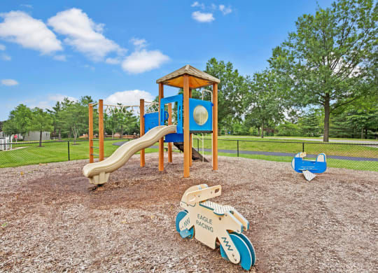 On-site playground with slide at Windsor Kingstowne, 22315