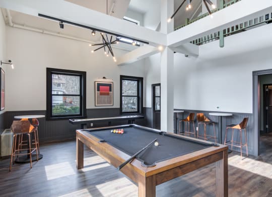 Game room with a pool table and a bar at Windsor Radio Factory, Melrose, MA