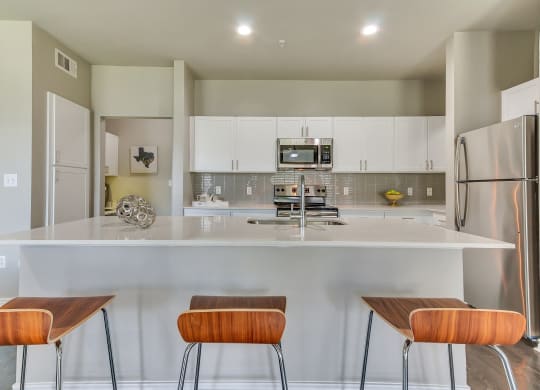 Stunning kitchens include quartz countertops at Legacy by Windsor, Texas