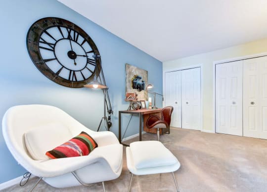 Windsor Oak Creek - Den or home office with a large clock on the wall in Fairfax VA