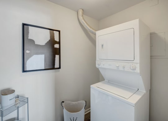 Laundry room with a washer and dryer at Windsor Kingstowne, Alexandria VA 22315