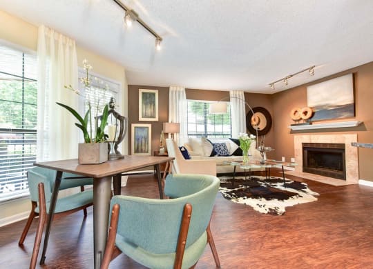 Apartments at Windsor Oak Creek feature living rooms with a fireplace in some units.