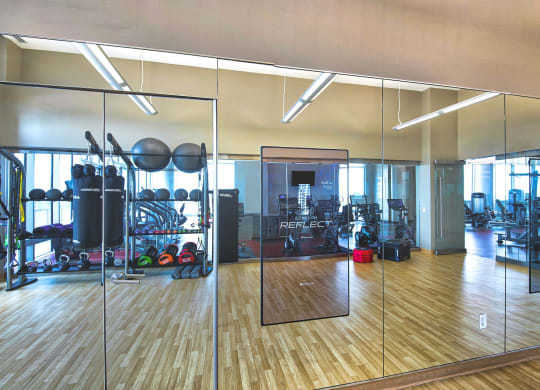 Fitness Center with Echelon Reflect smart mirrors at The Sovereign at Regent Square, 3233 West Dallas, TX
