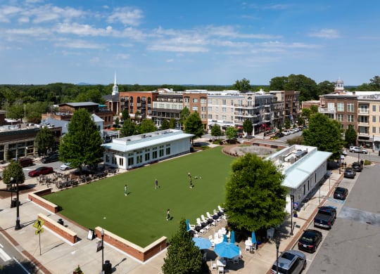 an aerial view of a park and buildings in a city