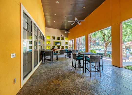 A patio with a table and chairs is shown.