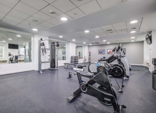 the gym at the district flats apartments in lenexa