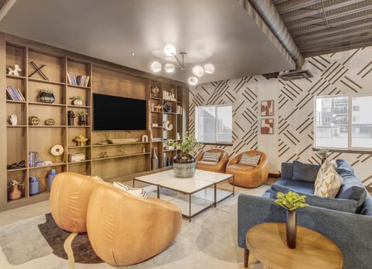 a living room with a couch and a tv