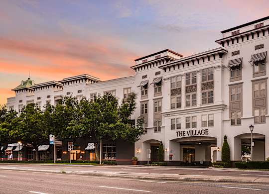 The front of a hotel called The Village.
