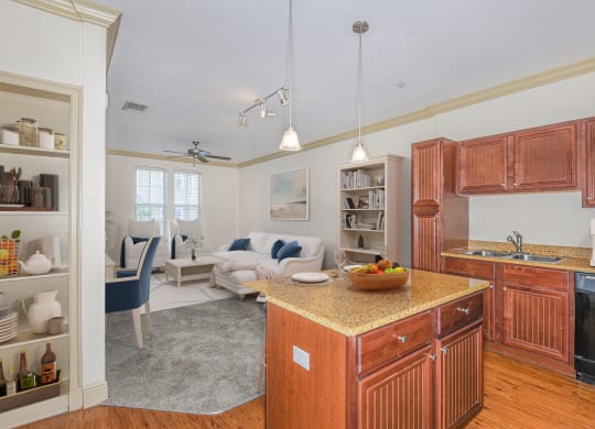 a kitchen with wooden cabinets and a counter top