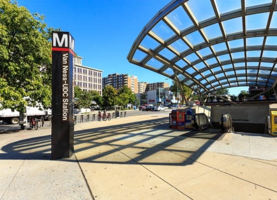 a metro station on the side of a city street  at The Saratoga Apartments, Washington 