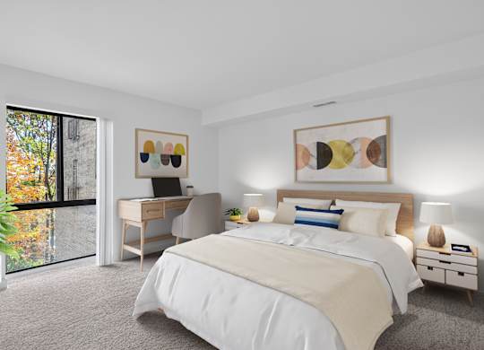 A bedroom with a large bed, a desk with a chair, and a painting on the wall.