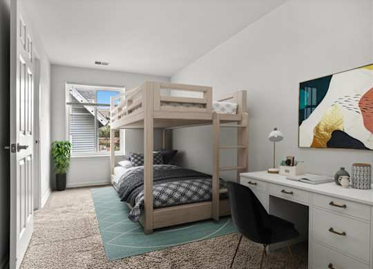 a bunk bed in a bedroom with a desk and a window