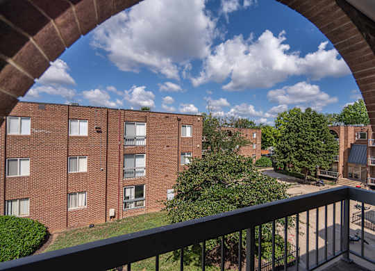 A view of a residential area from a balcony.