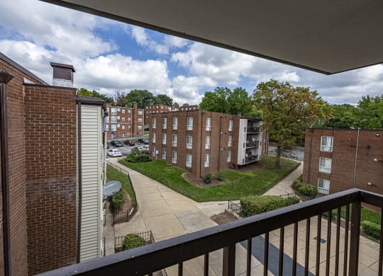 a view from a balcony of an apartment building