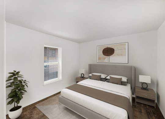 a bedroom with a bed and a potted plant