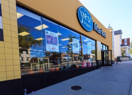the front of a store with a large glass window at Brookland Ridge Apartments, Washington DC