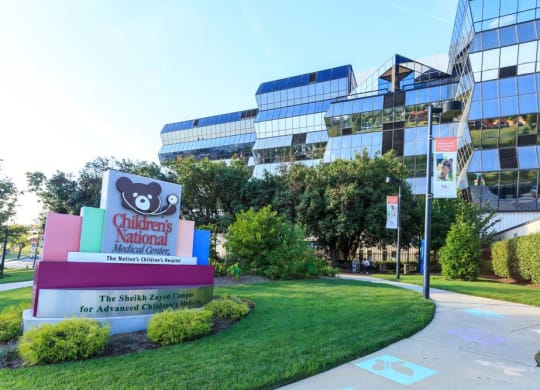 an office building with a sign at Brookland Ridge Apartments, Washington