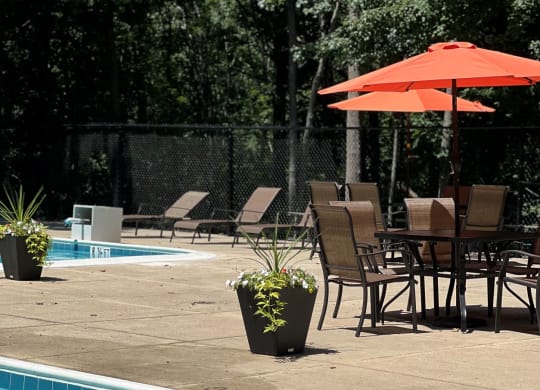 Poolside Dining Table at The Forest Apartments, Rockville, Maryland