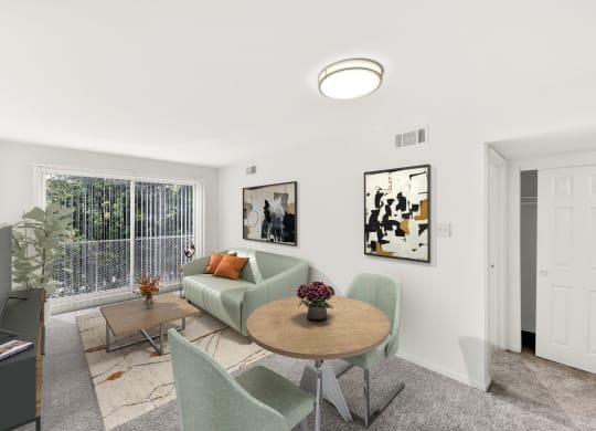 a living room with a couch and a table and chairs