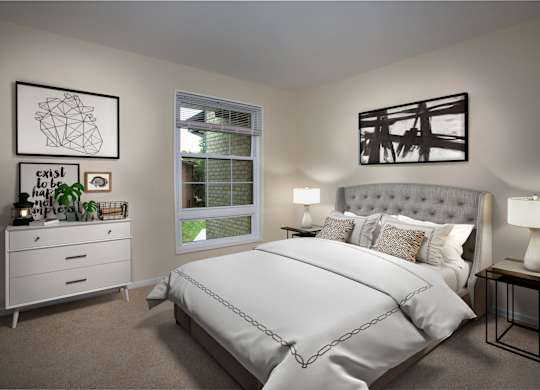 an example of a bedroom with a bed and a dresser