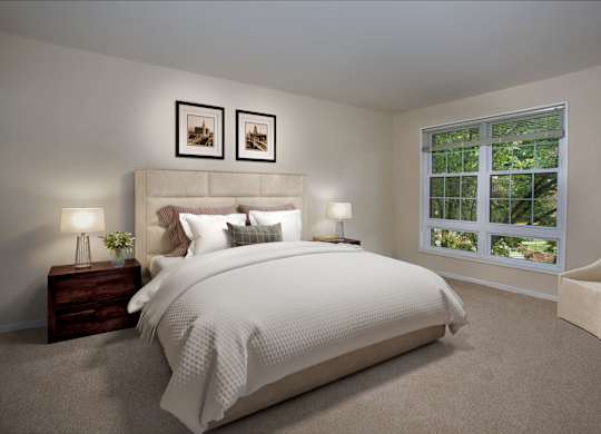the master bedroom has a neutral color scheme and a large bed