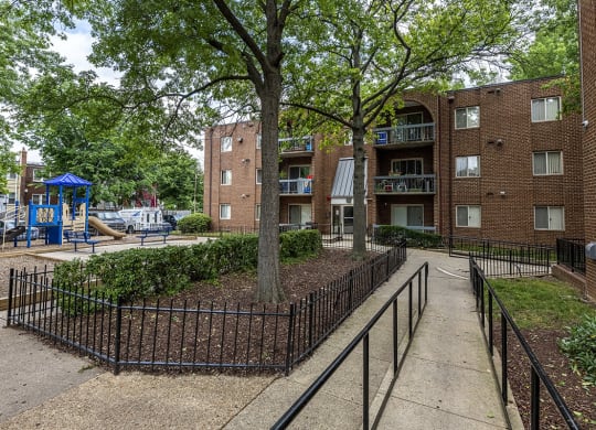 our apartments are located in a quiet area with a playground and trees