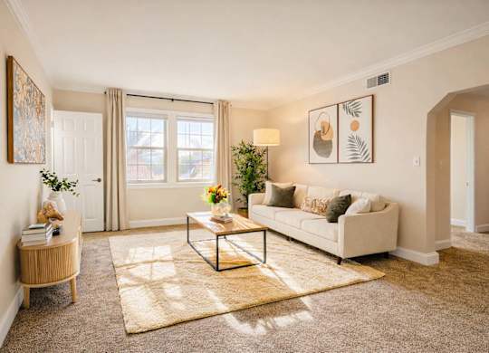 Bright living room with natural light at Highland Ridge Apartments, Capitol Heights, 20743