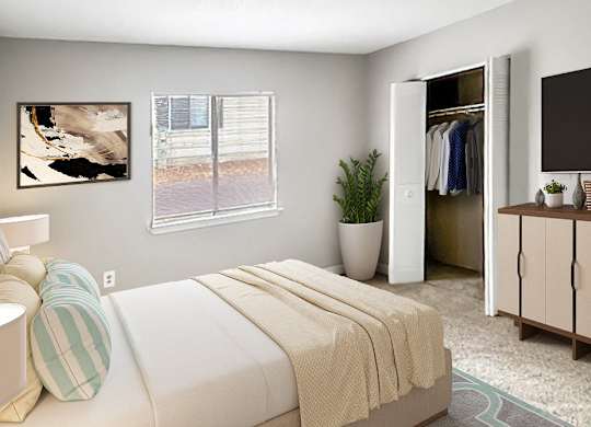 an image of a bedroom with a bed and a closet
