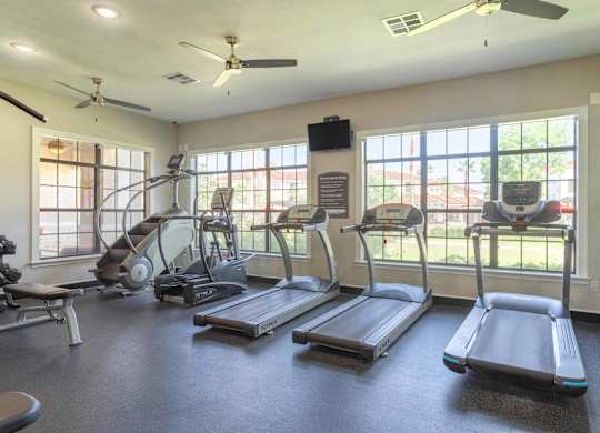 our apartments have a gym with a treadmill and elliptical machines at Century South Shore Apartments, League City, 77573