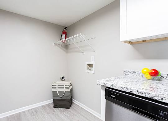 Laundry room with a washer and dryer at The Cobb Apartments-Townhomes, Austell, GA