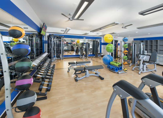 a large fitness room with treadmills and other exercise equipment at Marley EAV, Atlanta, GA, 30316