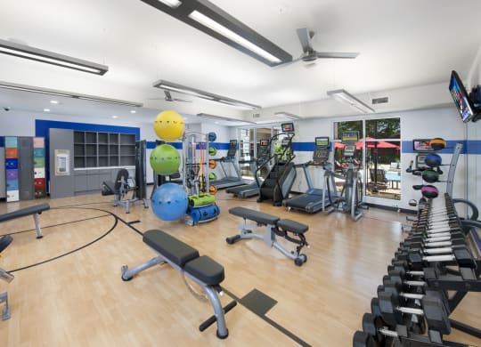 a spacious gym with treadmills and other exercise equipment at Marley EAV, Atlanta, GA, 30316