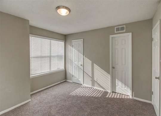 Carpeted Bedroom at The Hub at 934 Apartments, Georgia, 30349