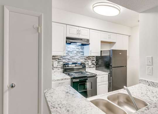 Sink With Faucet at The Hub at 934 Apartments, Atlanta, 30349