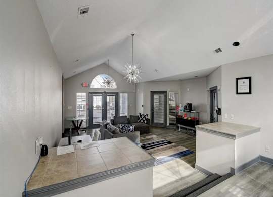 the living room and kitchen of a new home at The Sapphire, Georgia, 30035
