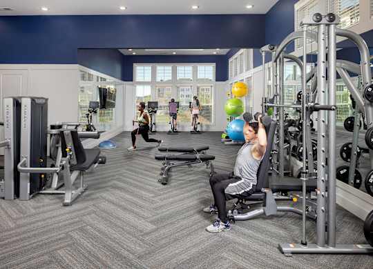 Fitness center at Century Mundy Mill Apartments, Oakwood, GA