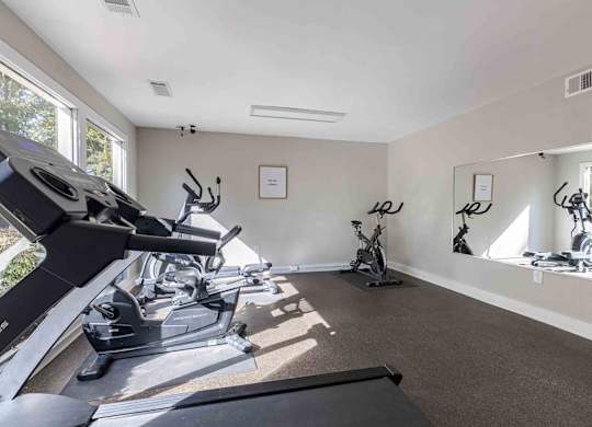 A room with treadmills and exercise bikes. at Grove at St. Andrews, South Carolina