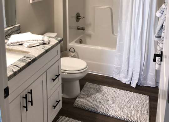 Bathroom With Bathtub  at Highland Hills Apatrtments, Grovetown, Georgia