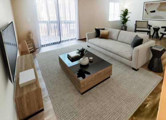 an aerial view of a living room with a couch and a coffee table