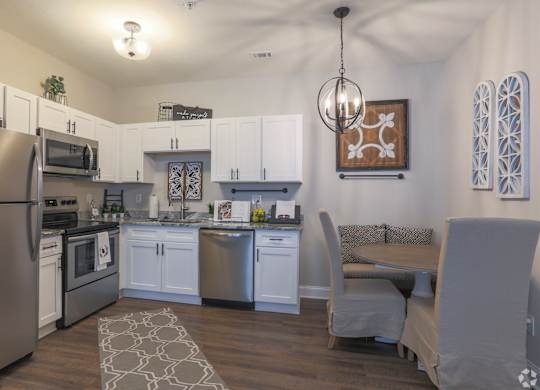 Kitchen with stainless steel appliances at Highland Hills Apartments, Grovetown Georgia