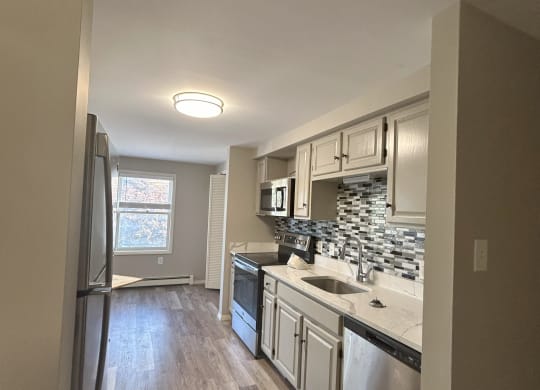 Large renovated kitchen at Briarcliff at Quechee Apartments, Vermont, 05059